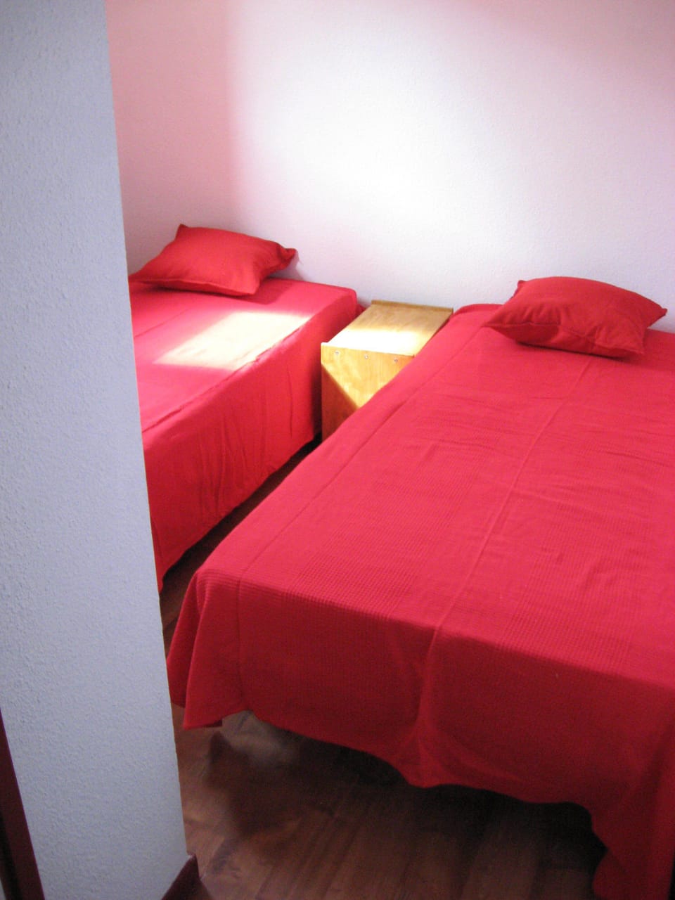 First bed room with 2 individual beds