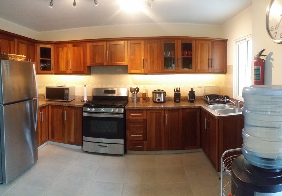 Panoramic view of the kitchen with brand-new appliances.