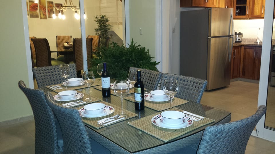 Terrace with access to kitchen and dining.