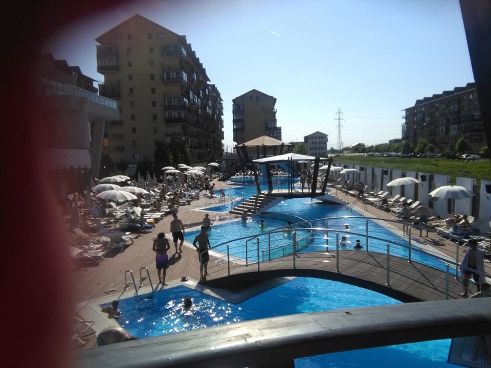Exterior swimming  pool  with open air restaurant  , 5 min from the studio