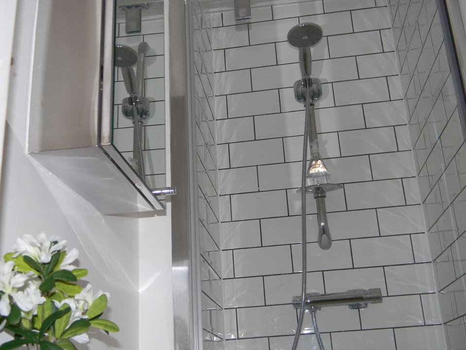 Brand new modern rain shower (not seen)