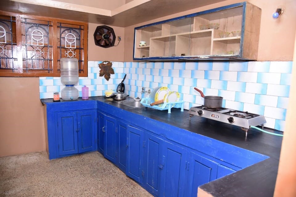 Kitchen - This is fully functional with Gas Stove and Basic cooking Utensils.