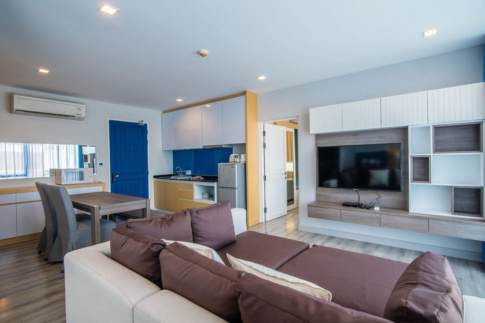 Living room with sofa bed & seaview