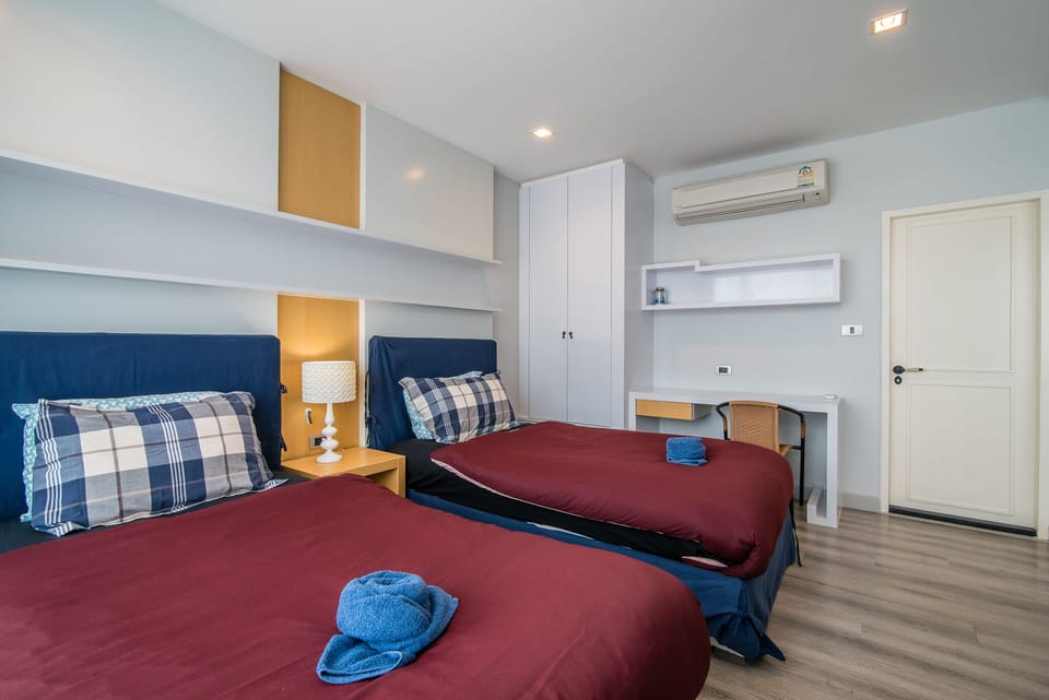Bedroom 2 has a wardrobe, work desk & chair