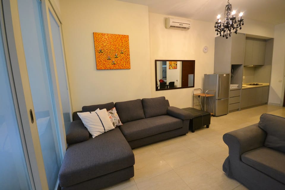 Large living room with comfy sofas