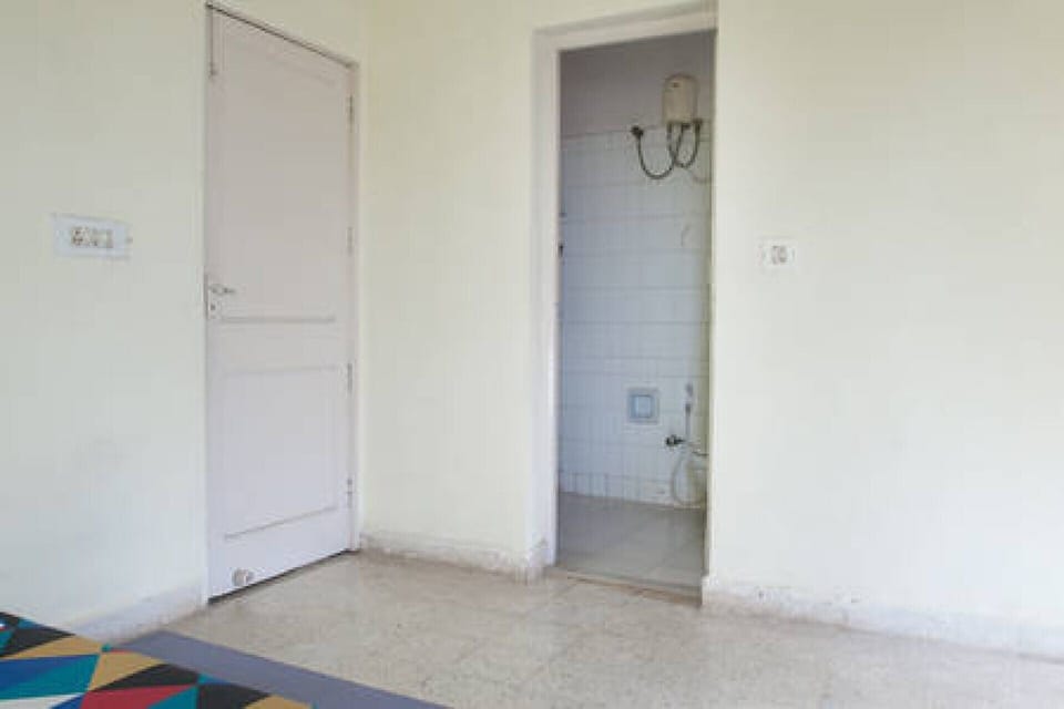 Master Bedroom showing attached toilet - taken this picture from the Window side