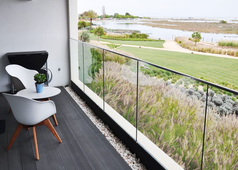 Terrace overlooking DelMar gardens, infinity pool and lagoon