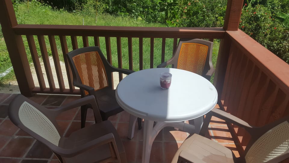 Patio with four chairs and table