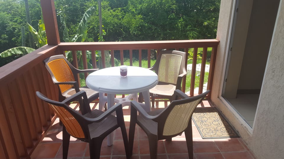 Patio with table and four chairs
