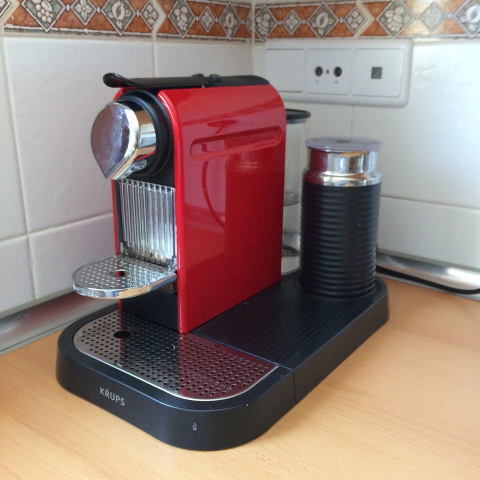 Nespresso coffee machine,  pods are easily available locally 
