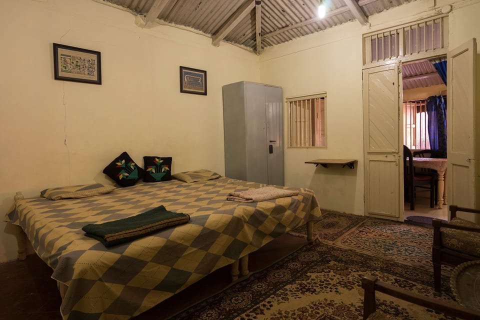 Room 1, with attached changing space and toilet/bath.