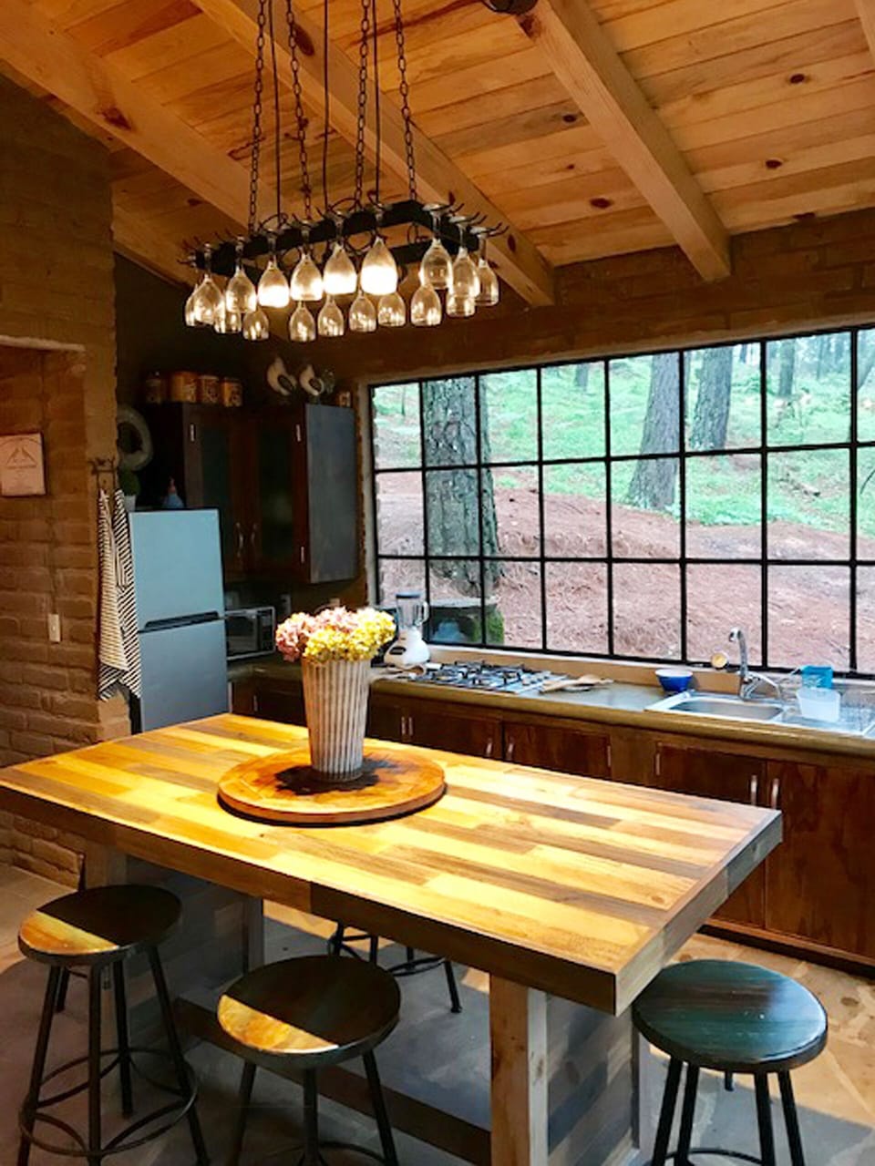 DINING ROOM WITH FOREST VIEW