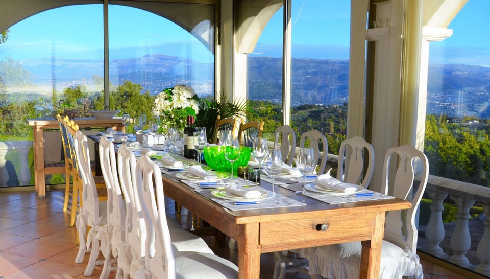 Kitchen with mountain views, setting up to 14 people.