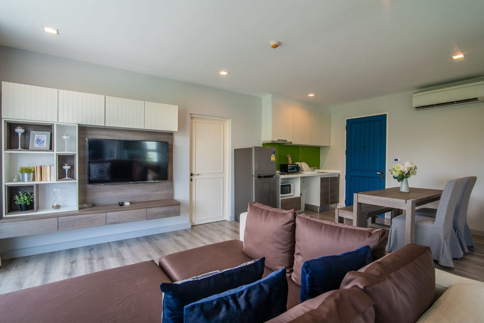 Living room with sofa bed and flat screen TV
