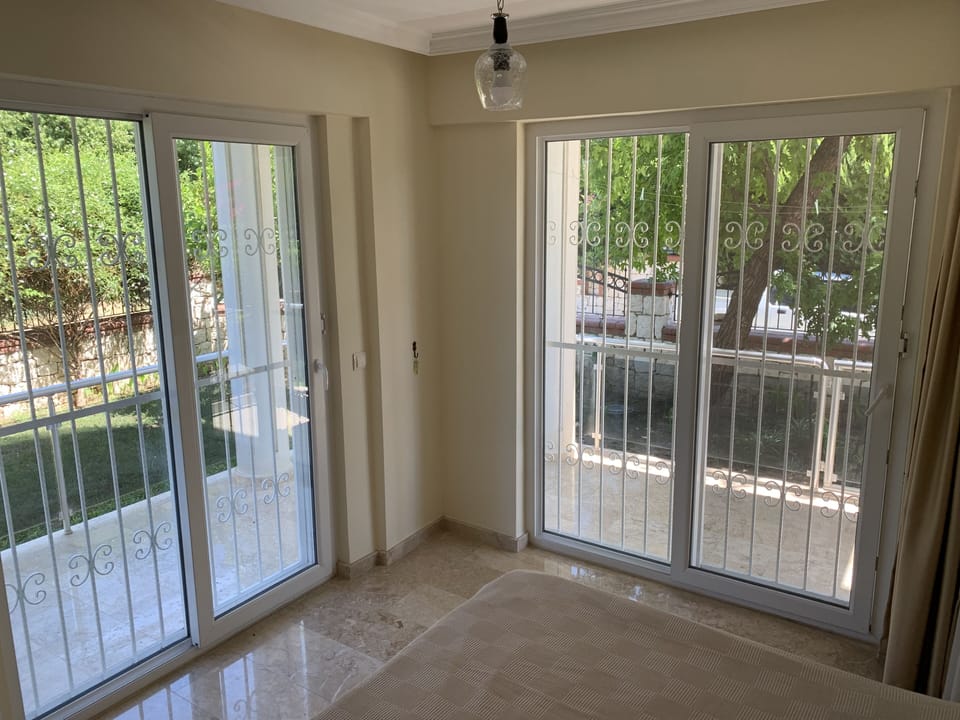Windows and patio bedroom 1
