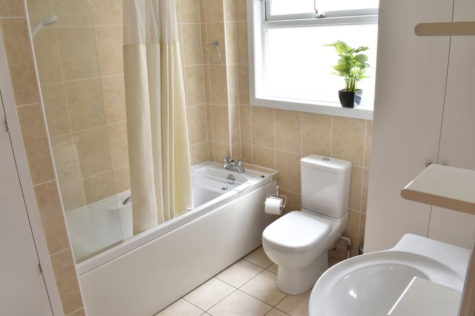 Bathroom - Full-size bath with overhead shower