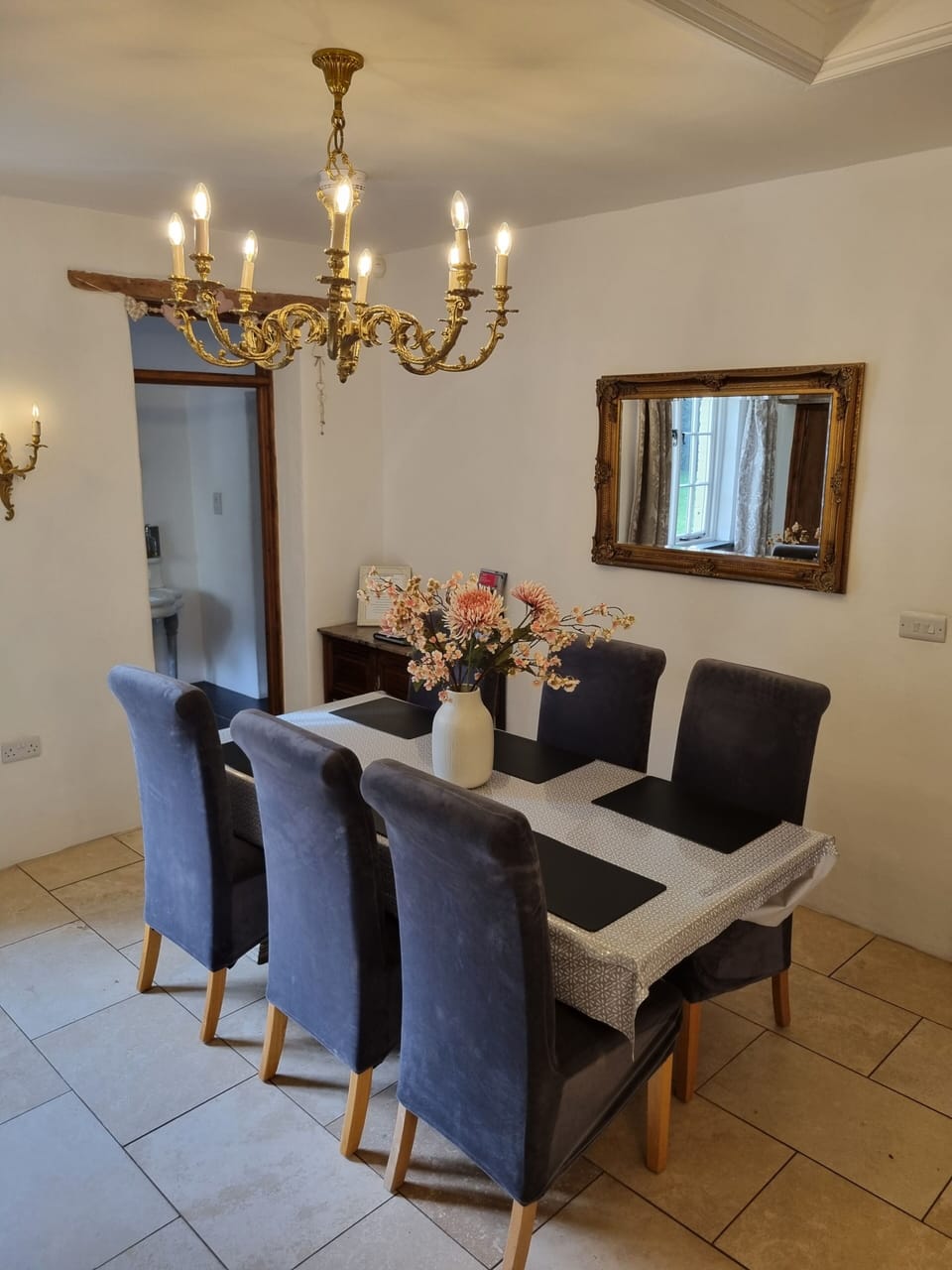 Dining area to seat 6 with a door leading to the main bathroom