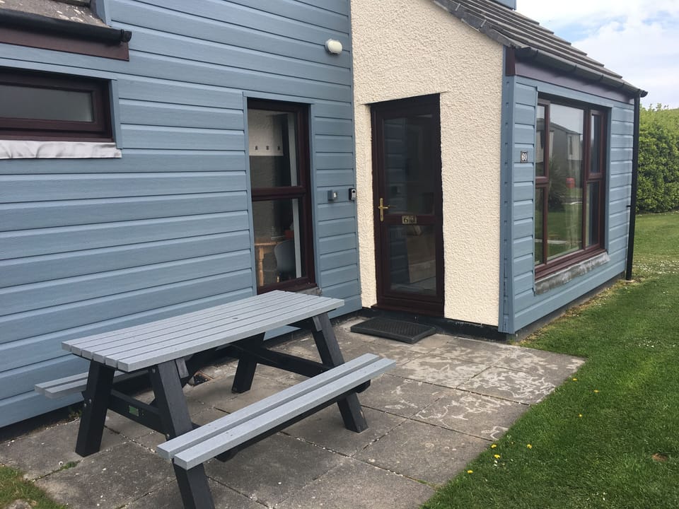 New Heavy Resin Picnic Bench  outside the property 