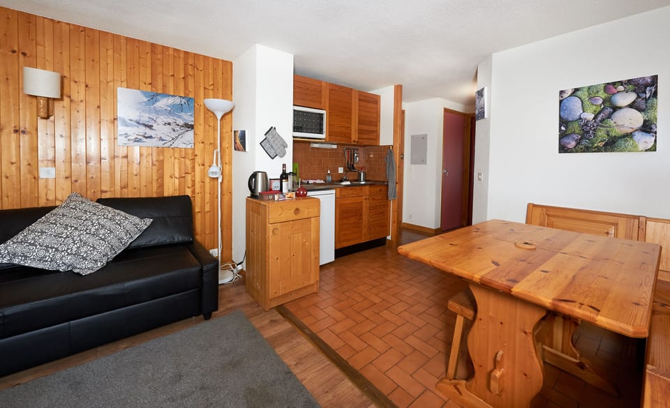Dining table and kitchen area