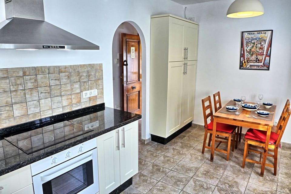 Modern kitchen with dining table