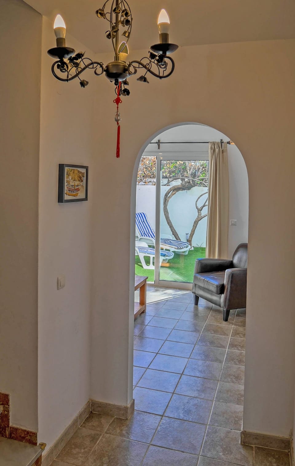 Entrance hallway looking from kitchen towards lounge.  Front door on the right.