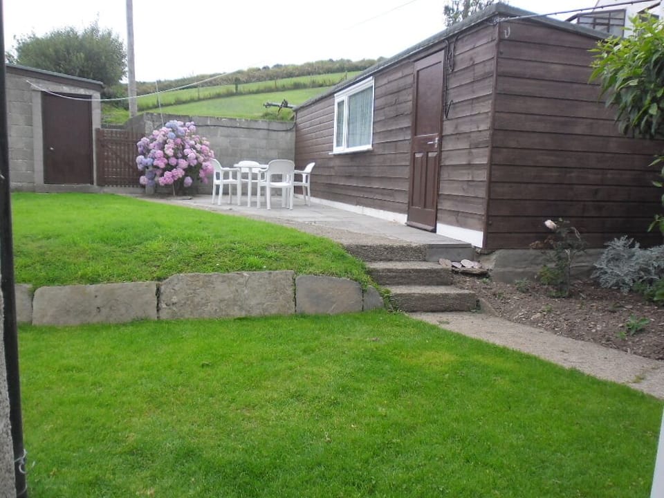 Contained garden suitable for BBQ's and safe for dogs.