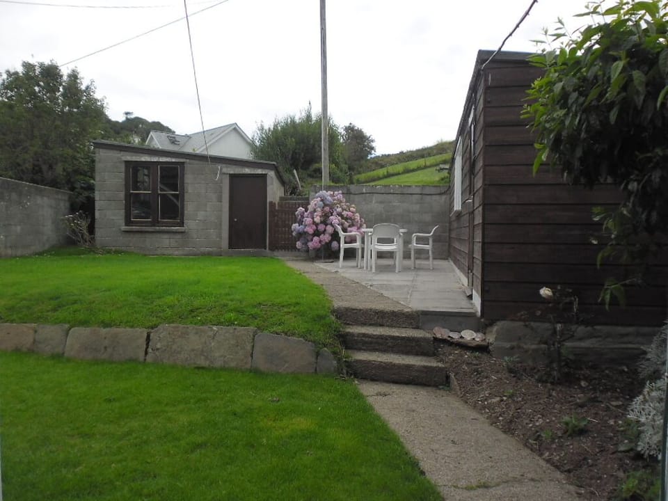  Patio seating area and with a washing line.  