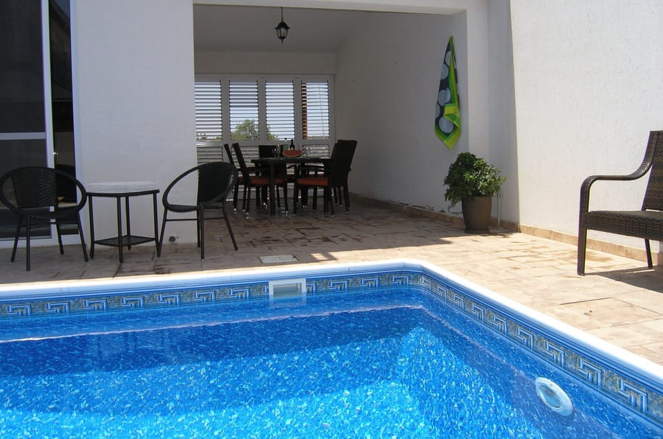 Relax by the pool.