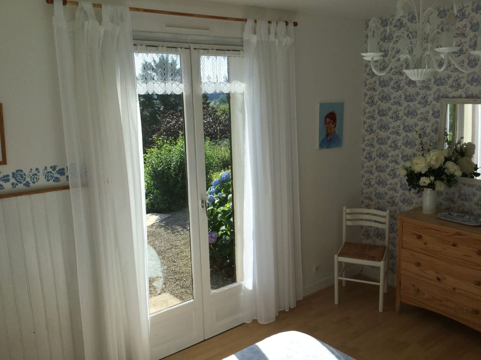 Blue double bedroom patio doors to the terrace