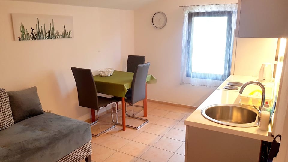 Living room with dining table. 