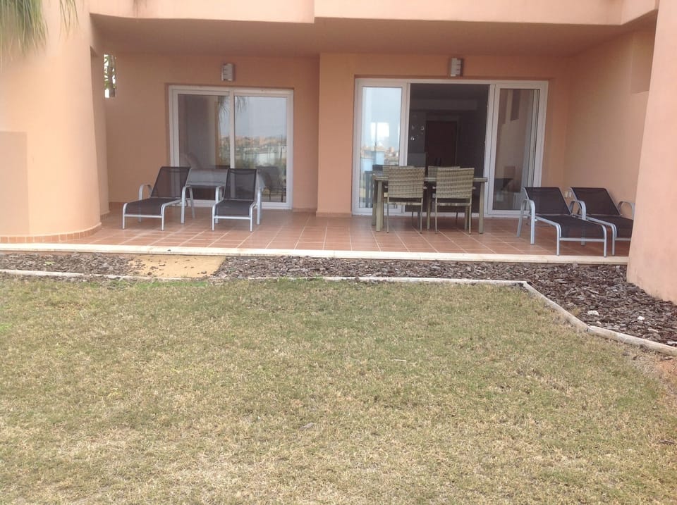 Main Terrace with Dining Table, chairs and sun loungers