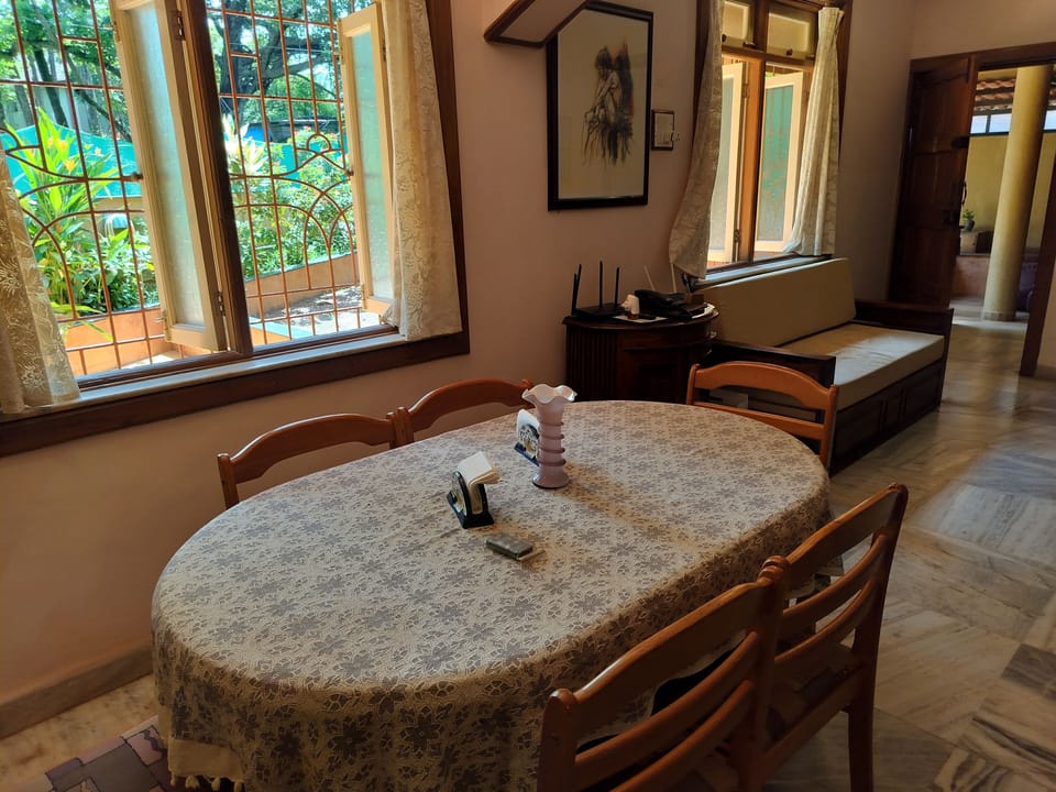Inside Dining: Wooden, Glass top, Six Seater. 