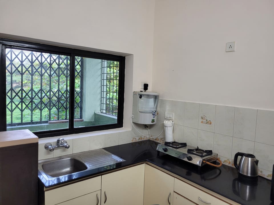 Basic utensils, cutlery, and dishes are provided for cooking.