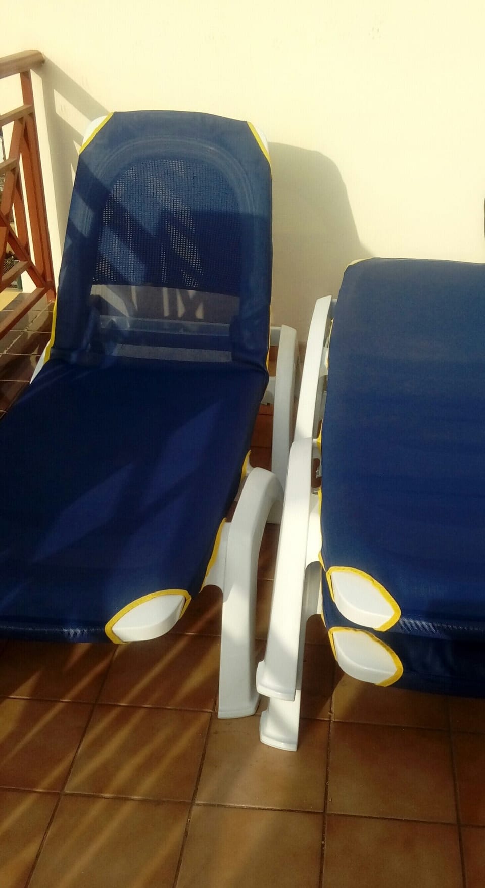 Sun loungers on balcony for your use.