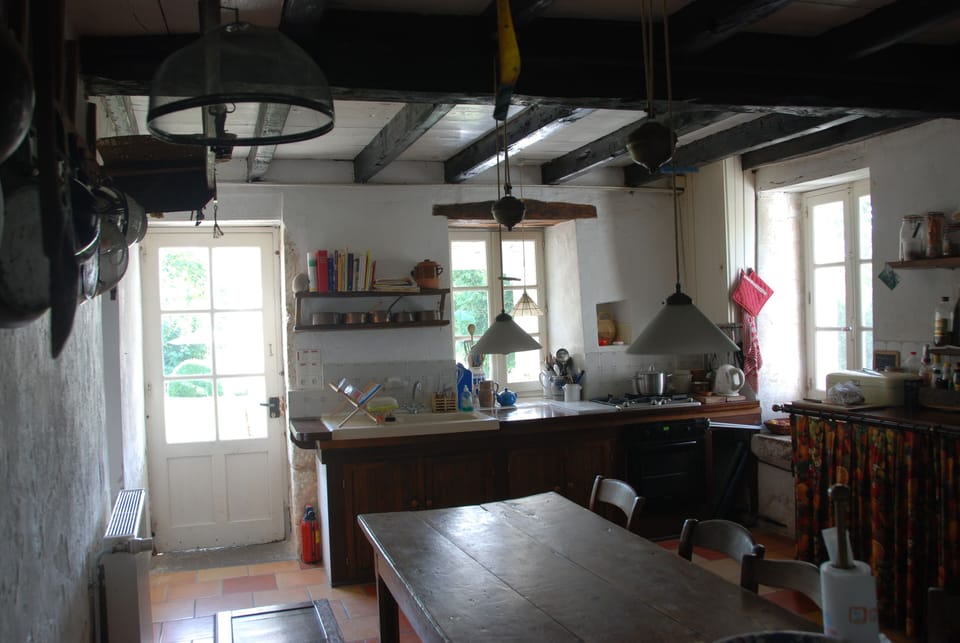 Kitchen with door to terrace and garden