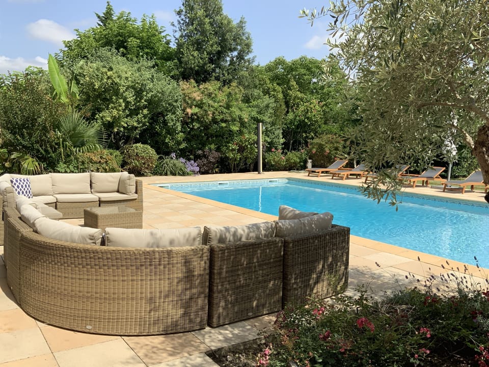 The outdoor sofas provide a great spot for morning coffee or an aperitif!
