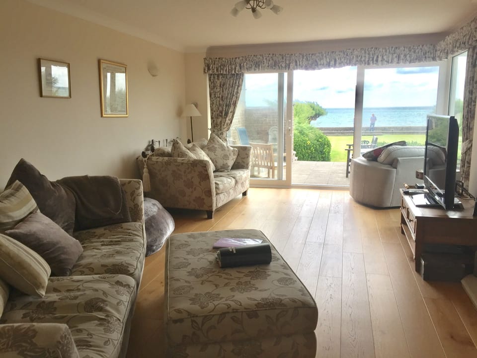 Lounge with Garden and Sea views