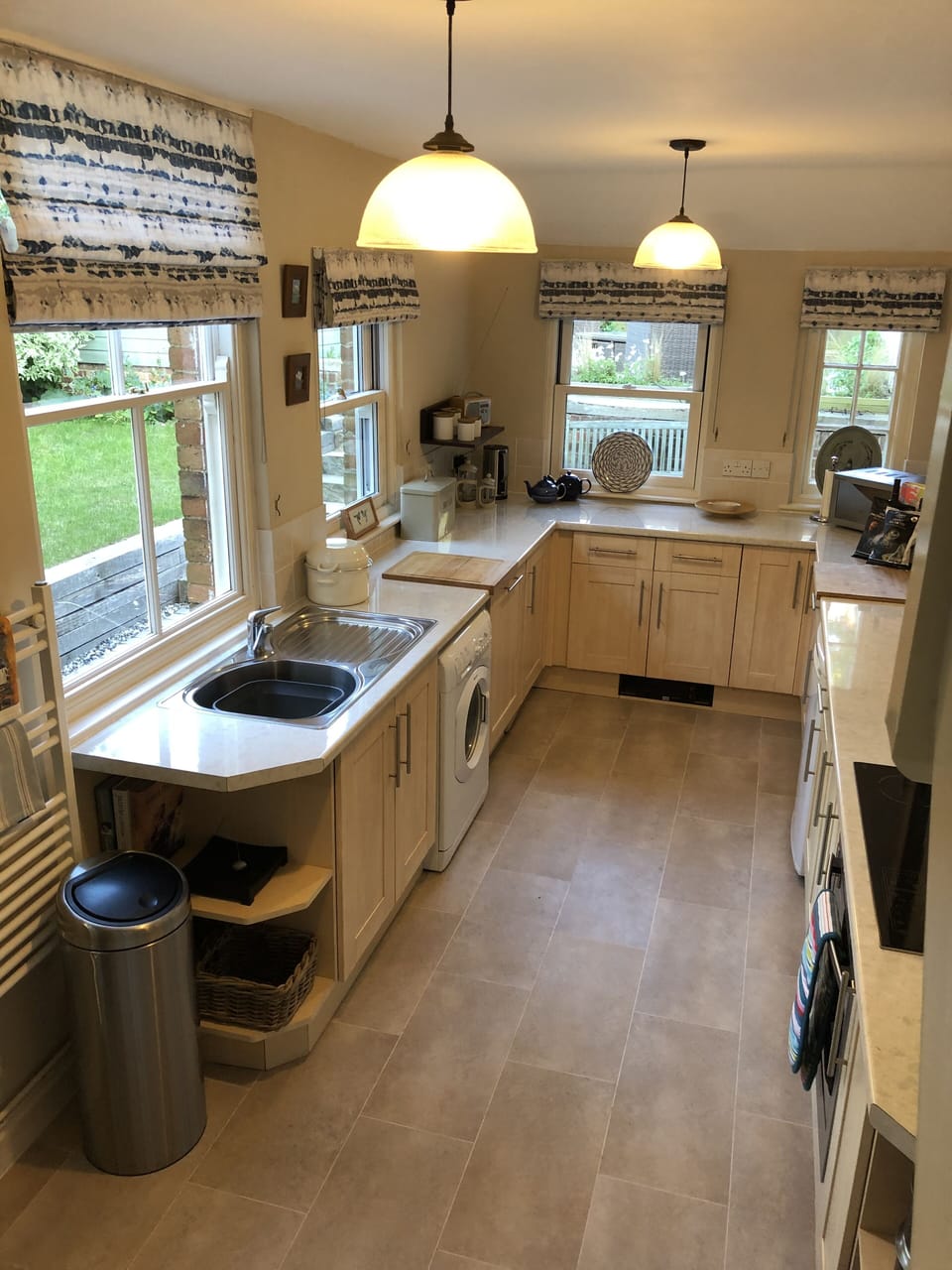 Kitchen leading to garden areas and stairs to bed 6
