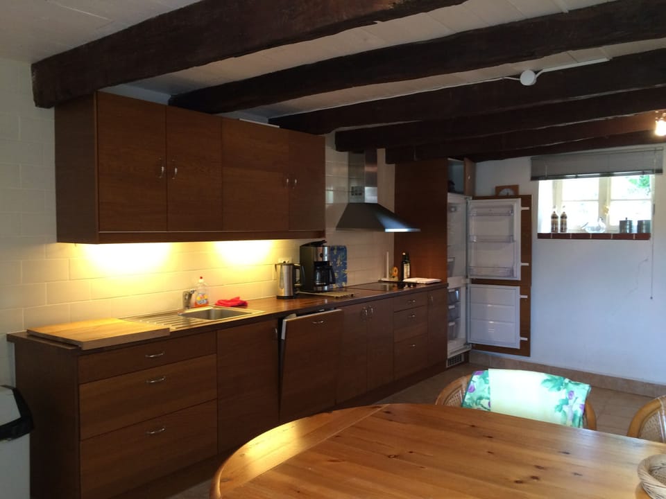 Grand Pessel's well equipped kitchen and dining room 