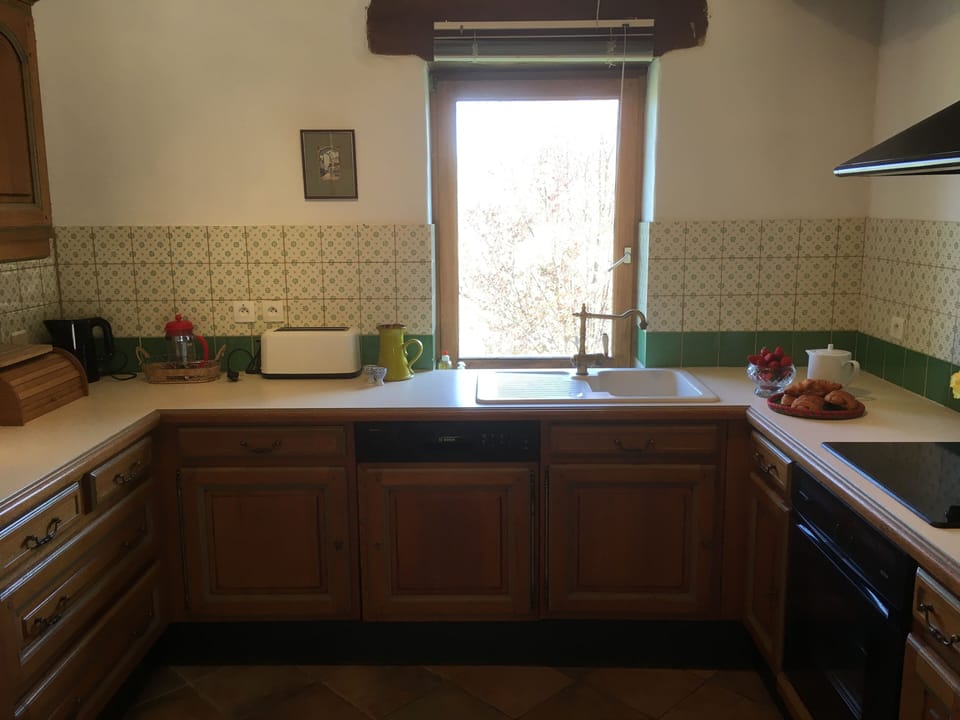 Kitchen open plan with sitting room dining area with all the usual amenities
