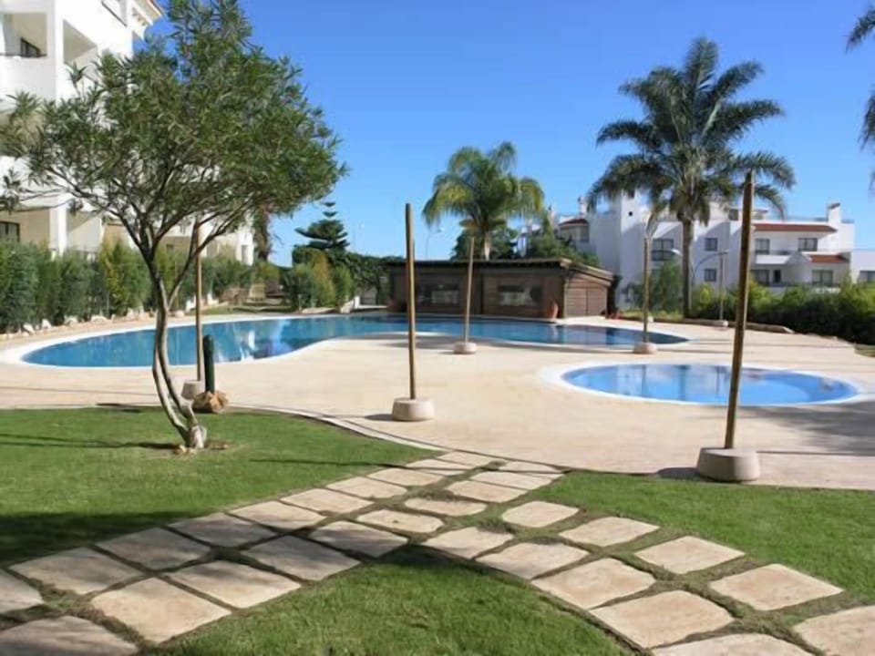 The pool terrace and gardens