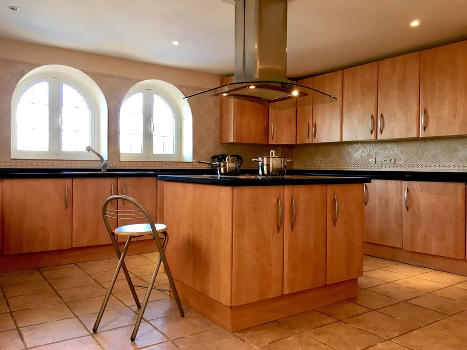Kitchen over looking the pool.