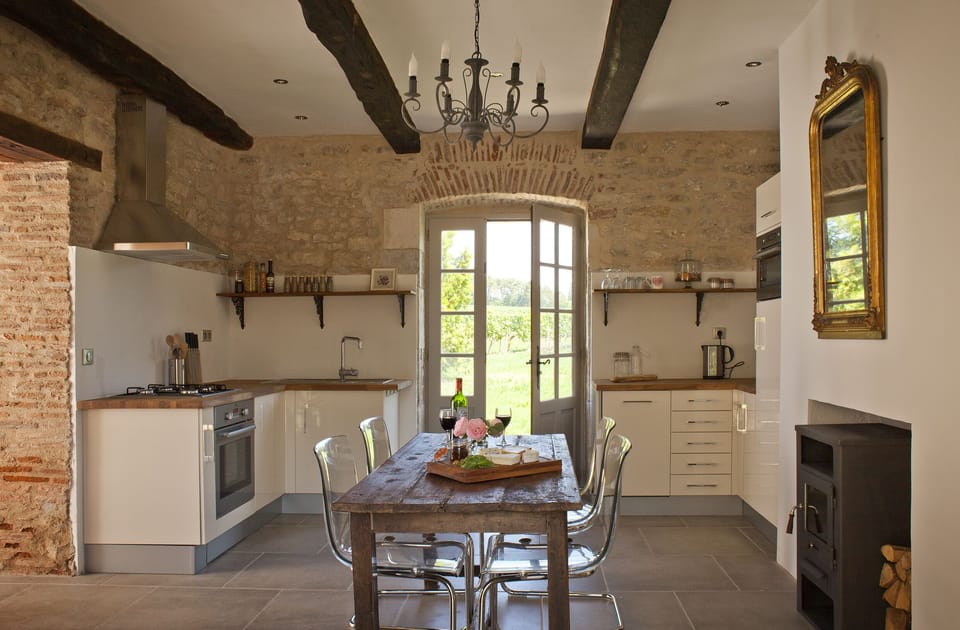 The kitchen and dining lead onto the private terrace