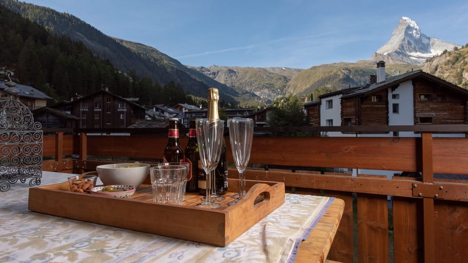 Enjoy the evening sun setting behind the Matterhorn from your balcony