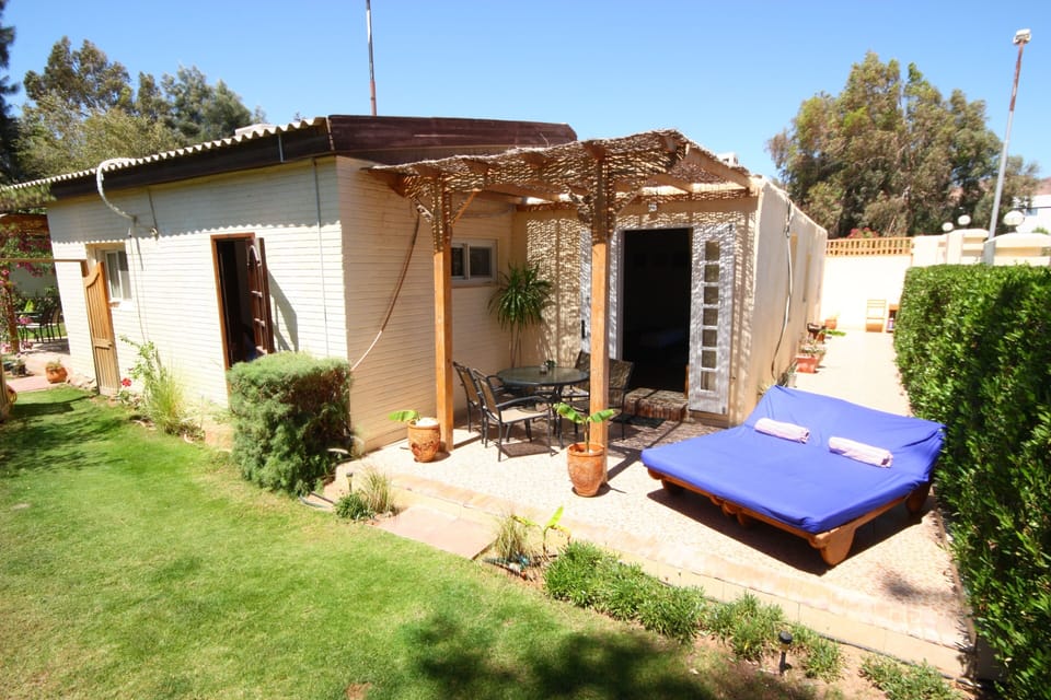 Octopus apartment private terrace and garden area with sunloungers