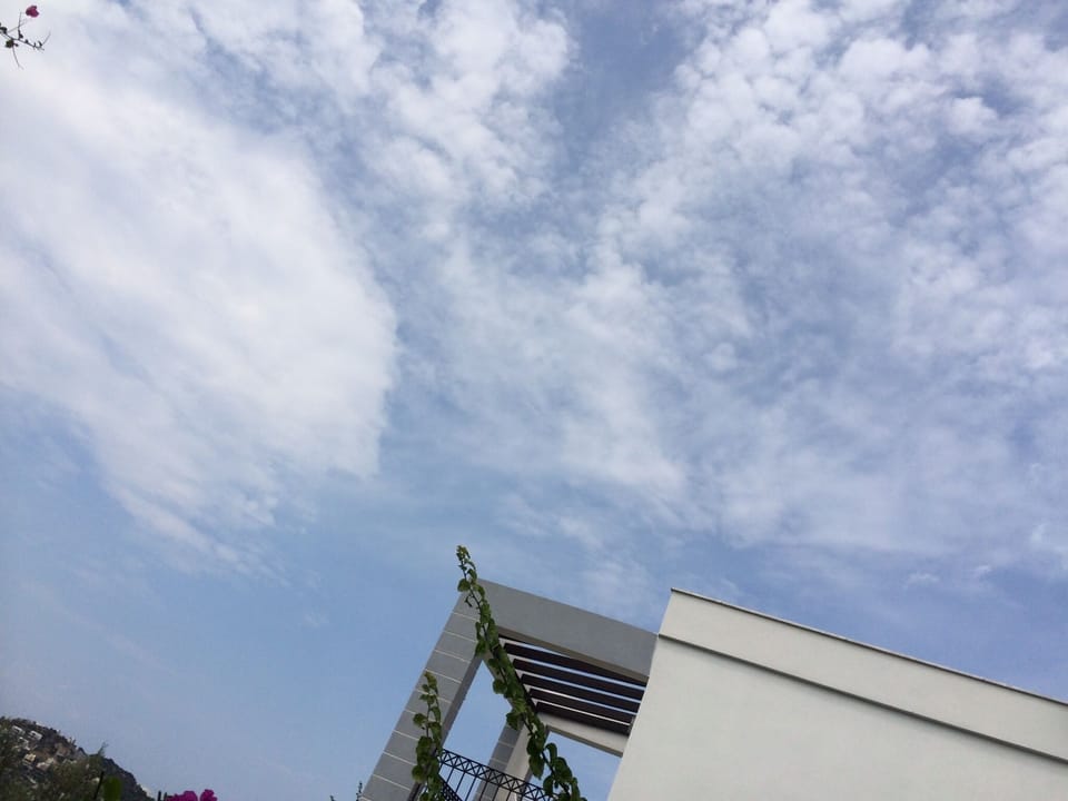 the expansive blue sky of the Aegean