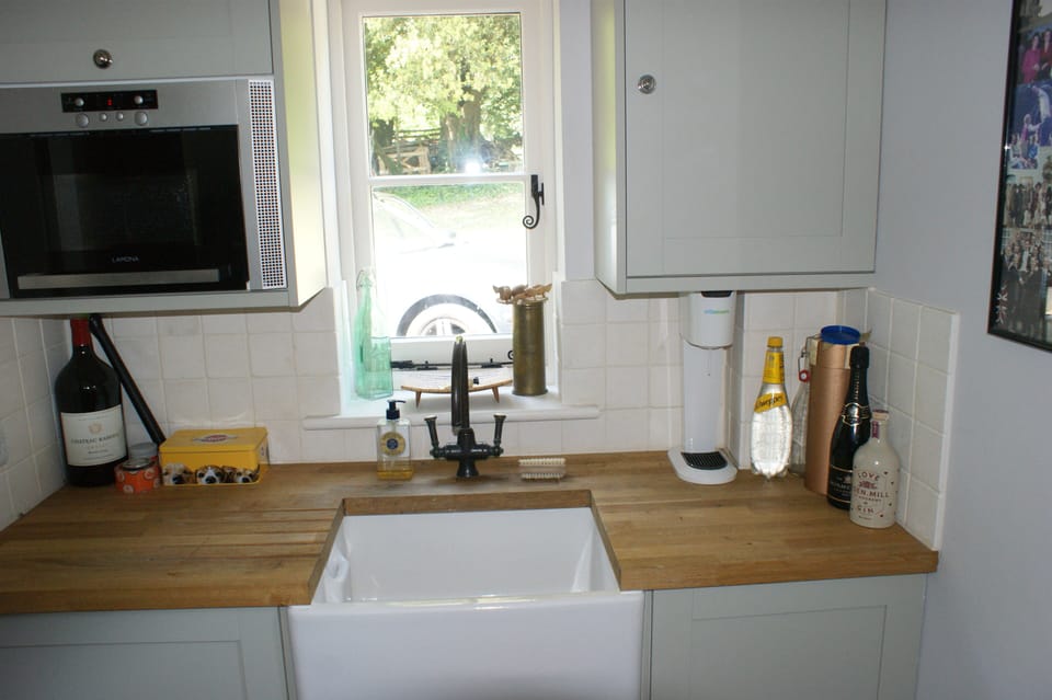 downstairs loo #2, next to back door with butler's sink and microwave