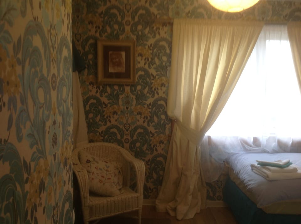 Twin bedroom with views over to Dalquarin castle.