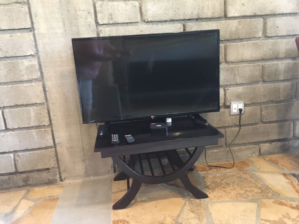 Wall mounted- 43" LG Smart TV with NETFLIX & YOUTUBE. Or plug in your USB/Laptop