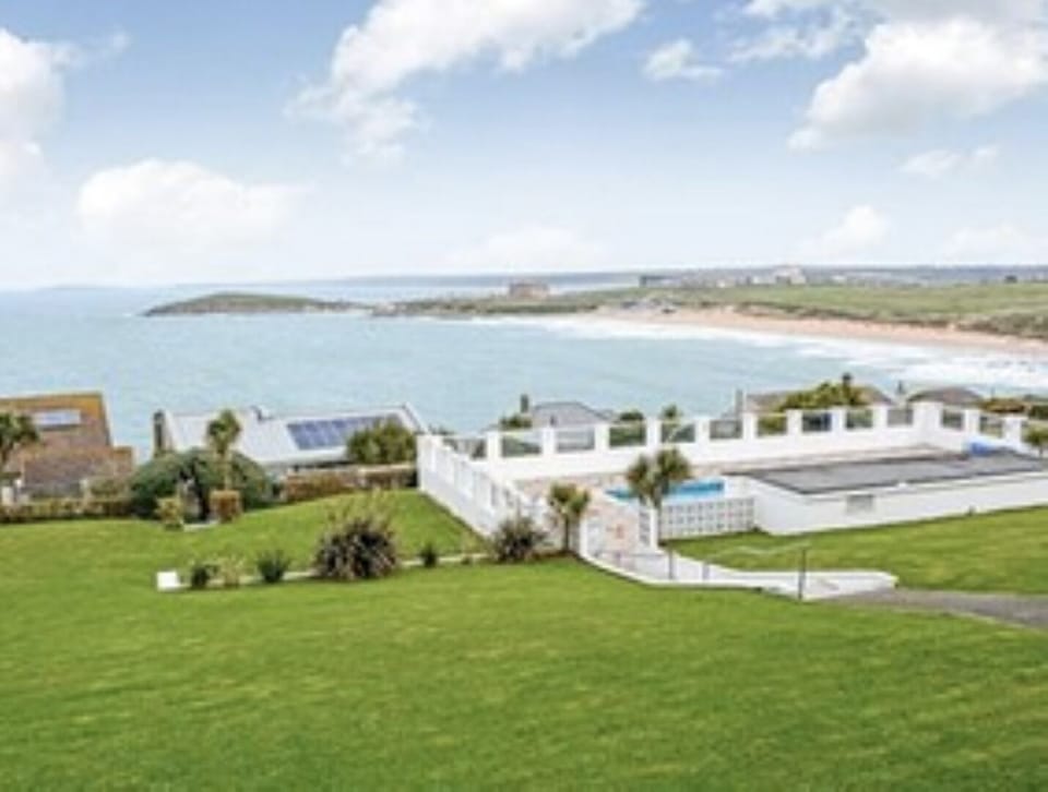 Spacious gardens and   swimming pool at the back of the property 